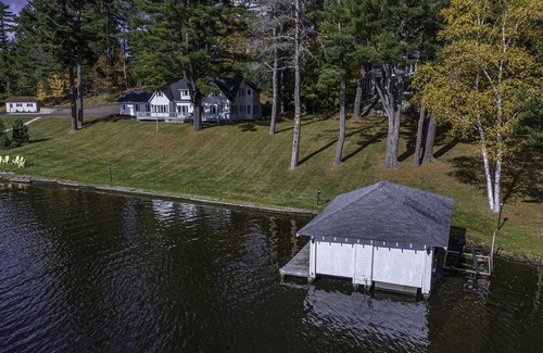 Eagle River House | Luxury Historic Eagle River Chain Lake Estate *Summer Fri to Fri Only*