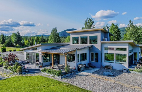 Libby House | Luxury Home on the Kootenai River with Panoramic Cabinet Mountain Views