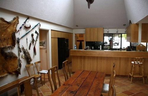 Charlevoix House | Luxury Lakefront Property with private dock, tennis court, trails & views