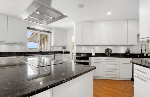 Sunrise Beach House | Luxury Lakefront Home-Heated Pool, Fireplace & Hot Tub