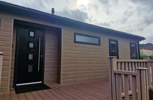 Llanfair Caereinion House | Luxury Lodge - Sleeps 4 hot tub & parking