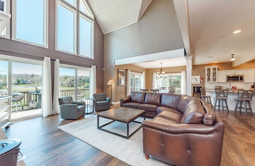 Waterfront Greens House | Luxury Lodge w/Lake Access, Hot Tub & Games