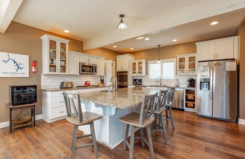 Waterfront Greens House | Luxury Lodge w/Lake Access, Hot Tub & Games