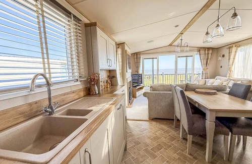 Hopton on Sea Cabin | Luxury lodge with stunning full sea views at Hopton ref 80010W