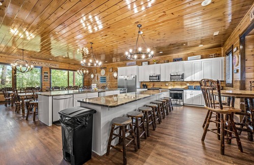 Gatlinburg Cabin | Luxury lodge with 13 king suites, theater, game room & views!