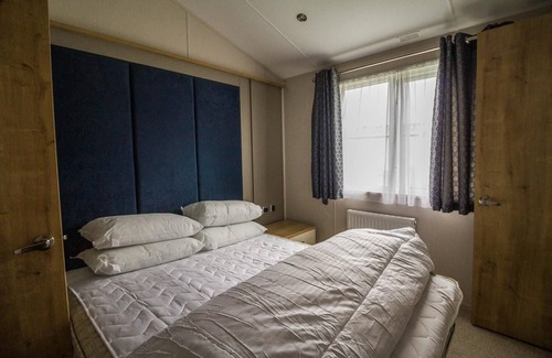 Hunstanton Cabin | Luxury lodge with decking in Hunstanton at Manor Park ref 23144K