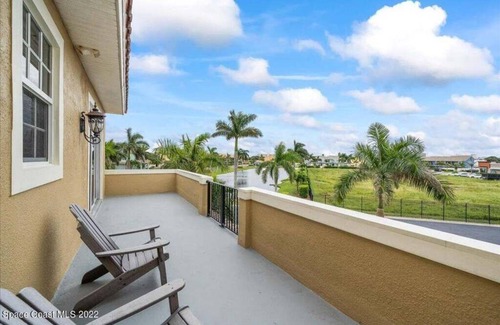 Indian Harbour Beach House | Luxury Mediterranean villa with courtyard by the beach where you eat, play love.