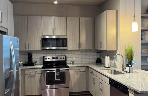 Home Park Apartment | Luxury Midtown Oasis: Rooftop & Pool