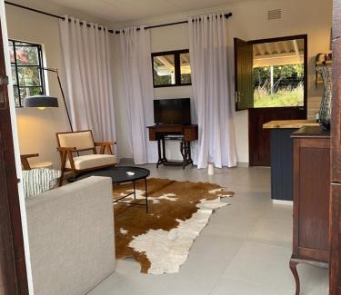 Hibiscus Coast Villa | Luxury modern farm cottage with sea view