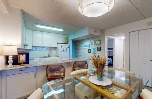 North Ocean City Condo | Luxury Oceanfront - beach condo with balcony, shared pool, WiFi, wash/dryer & AC