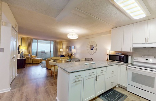 North Ocean City Condo | Luxury Oceanfront - beach condo with balcony, shared pool, WiFi, wash/dryer & AC