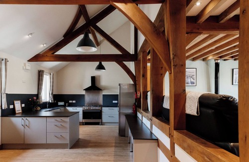 Devils Bridge House | Luxury renovated barn with a large hot tub and games room. Sleeping 16