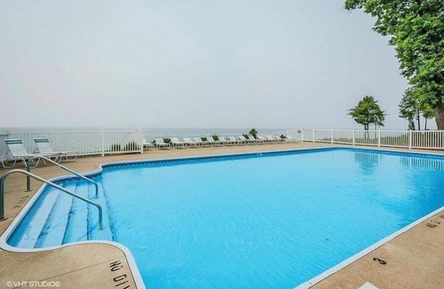 Bluffs of South Haven House | Luxury Retreat with Lake Views, Hot Tub, Fire Pit & Association Pool