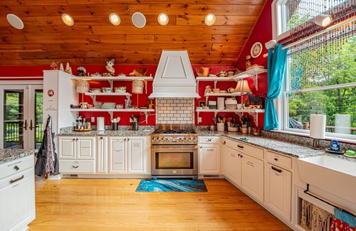 Friendsville Cabin | Luxury Riverfront Lodge sleeps 25 w/Heated Pool, Great for Family Reunions