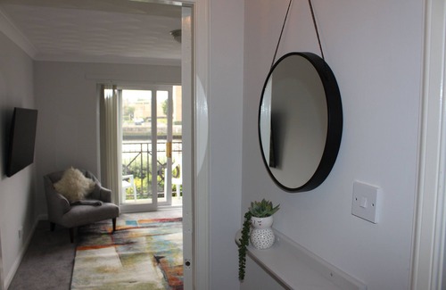 Ayr Apartment | Luxury Riverside Retreat with Sunny Balcony