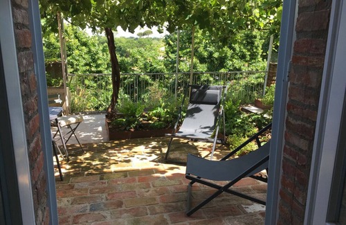 Citta della Pieve Apartment | Luxury self-catering studio with a private garden in a charming historic town