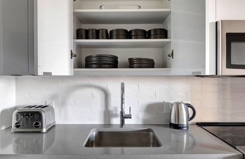 South of Washington Apartment | Luxury South End 1BR w. W/D and Gym, by Blueground