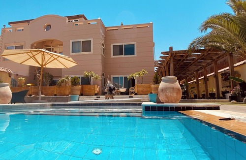 Al Ahyaa Apartment | Luxury spacious rooftop apartment with private rooftop terrace and sea view.