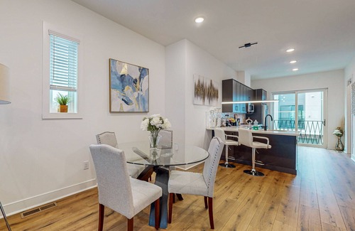 Lindridge-Martin Manor House | Luxury townhome with open-concept living space & gas fireplace