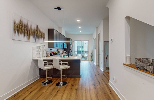 Lindridge-Martin Manor House | Luxury townhome with open-concept living space & gas fireplace