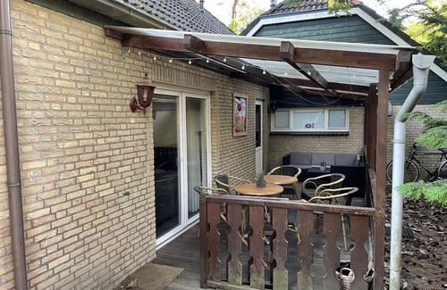 Lochem House | Luxury vacation home with bar billiards and sauna in wooded area