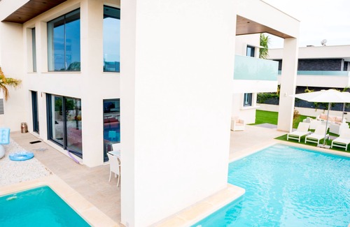 Los Cuarteros Villa | Luxury Villa walking distance to the beach, located next to a park.