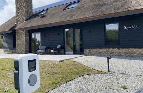 Nes Villa | Luxury villa Sig Ward with pool, sauna, spacious living room and beach 1 km away