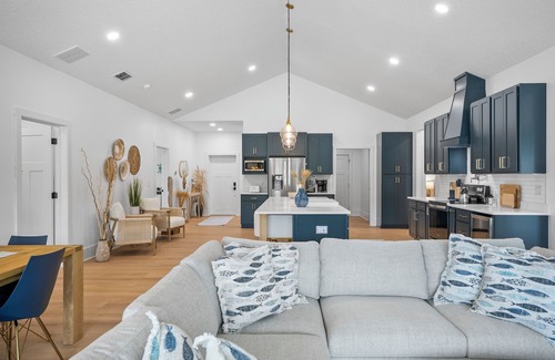 Palm Harbor House | Luxury Waterfront Escape – Private Dock, Heated Pool & Game Room! Pet-Friendly!