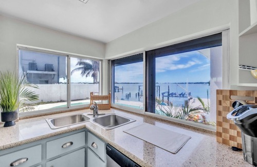 St. Petersburg - Clearwater House | Luxury Waterfront Farmhouse Retreat w/Saltwater Pool, Dock & Tiki Bar
