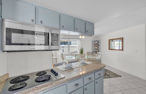 St. Petersburg - Clearwater House | Luxury Waterfront Farmhouse Retreat w/Saltwater Pool, Dock & Tiki Bar