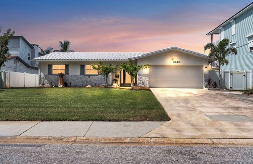 St. Petersburg - Clearwater House | Luxury Waterfront Farmhouse Retreat w/Saltwater Pool, Dock & Tiki Bar