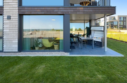 Marienleuchte Apartment | Lykke vacation apartment - pure sea view. Sauna. Family-friendly.