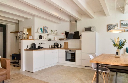 Rysum Apartment | "Maartje" Cozy & modern with sun terrace in Rysum - Van Senden