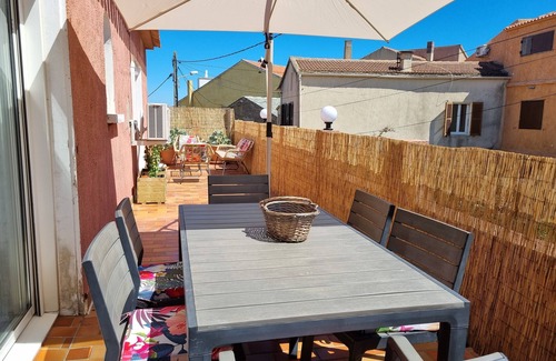 Rogliano Apartment | Macinaggio apartment 100m2, 2 terraces, 3 bedrooms close to shops and sea.