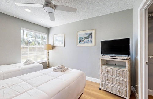 Royal Palm Bay Condo | Magical condo with playground, pool, hot tub, tennis courts, & washer/dryer