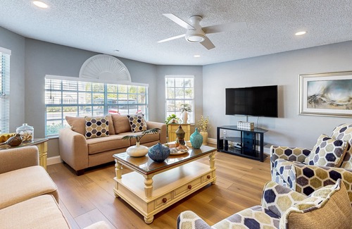 Royal Palm Bay Condo | Magical condo with playground, pool, hot tub, tennis courts, & washer/dryer
