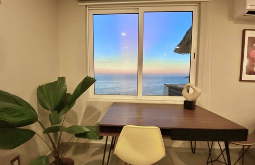Brisas del Marques Condo | Magical sunsets, king bed, and pro service B403