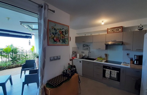 Schoelcher Apartment | Magnificent T2 Beachfront, pontoon access to the sea, small garden.