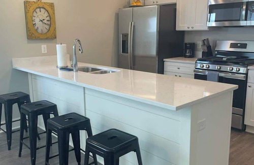 Quad Cities Condo | Main Floor 2 Bedroom Condo in Bettendorf featuring king bed in master