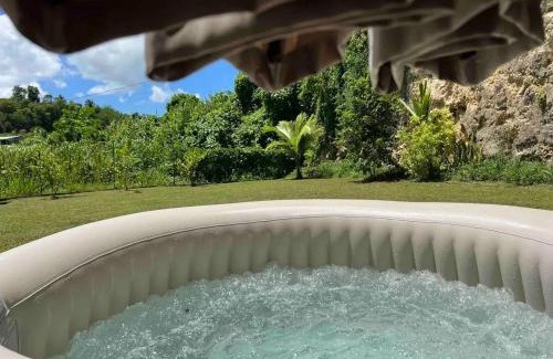 Point d'Or House | Maison chaleureuse aux Abymes avec jacuzzi relaxant