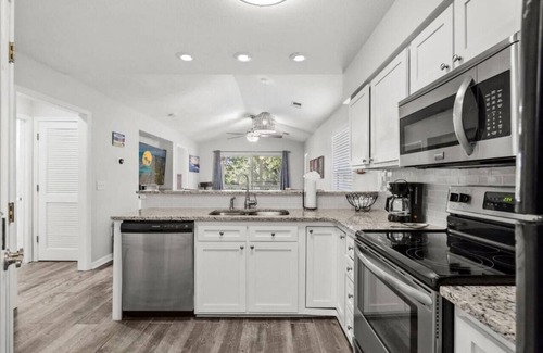 The Dunes Condo | Maison Place Unit I offers a serene stay a quick walk to the Beach!
