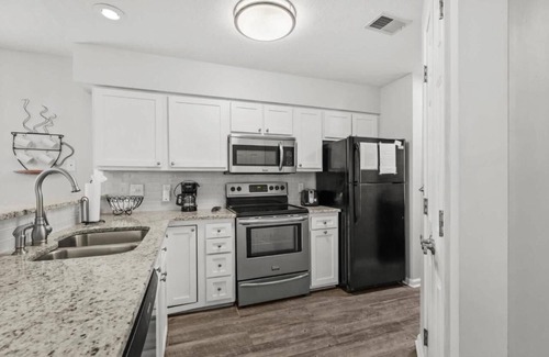 The Dunes Condo | Maison Place Unit I offers a serene stay a quick walk to the Beach!