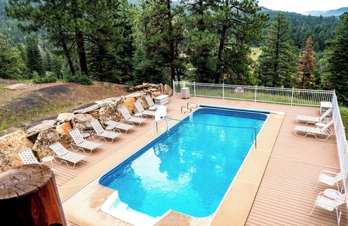 Purgatory House | Majestic Manor with Private Pool, Theater Room, Large outdoor wedding altar