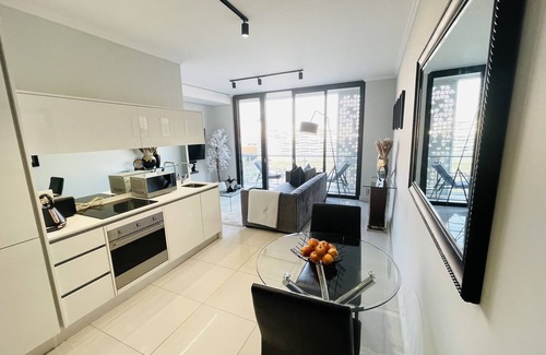 Greater Johannesburg Metropolitan Area Condo | Mall of Africa view, Cozy 1bed Condo.