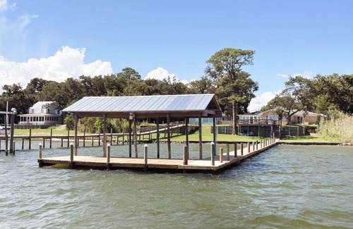 Mary Esther House | Massive Waterfront Wonder with 5 Bedroom & Boat dock/Pet-Friendly.