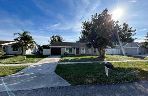 Royal Palm Beach House | Master Bedroom w Pvt Bath in shared home
