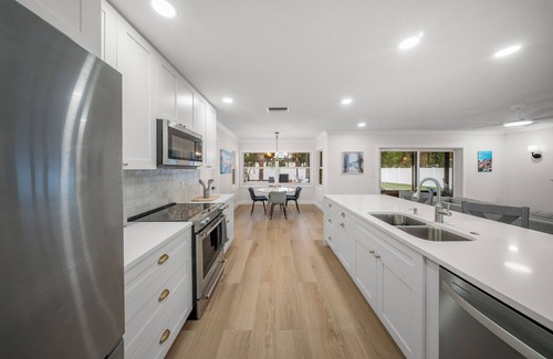 Lake Magdalene House | Mediterranean Oasis! Pool, Game Room & Lounging