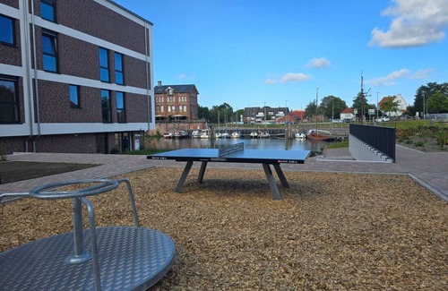 Suderneuland I Apartment | Meeresrauschen - vacation with terrace, sauna & garden at the Norder Marina