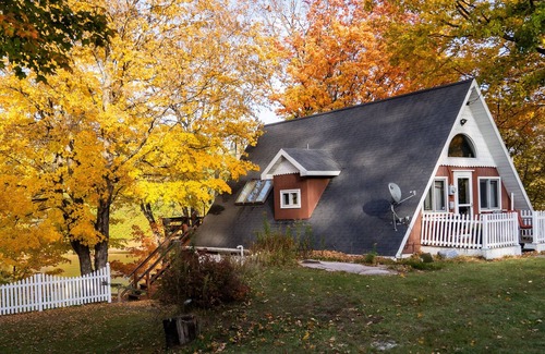 Cornell Ski Chalet | Michigans Upper Peninsula ON the Escanaba River with wooded 5 acres of Privacy.