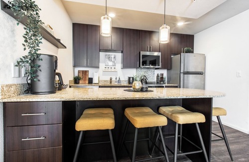 Overland Park Apartment | Mid-Rise Luxury 1 BR 1 BD Free Carport Parking WiFi and Dedicated Workspace